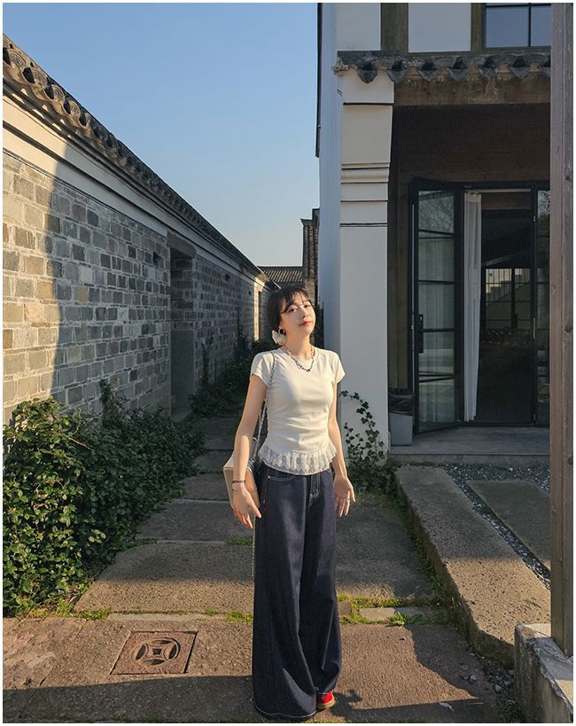 TP045 甜美蕾丝拼接下摆正肩上衣